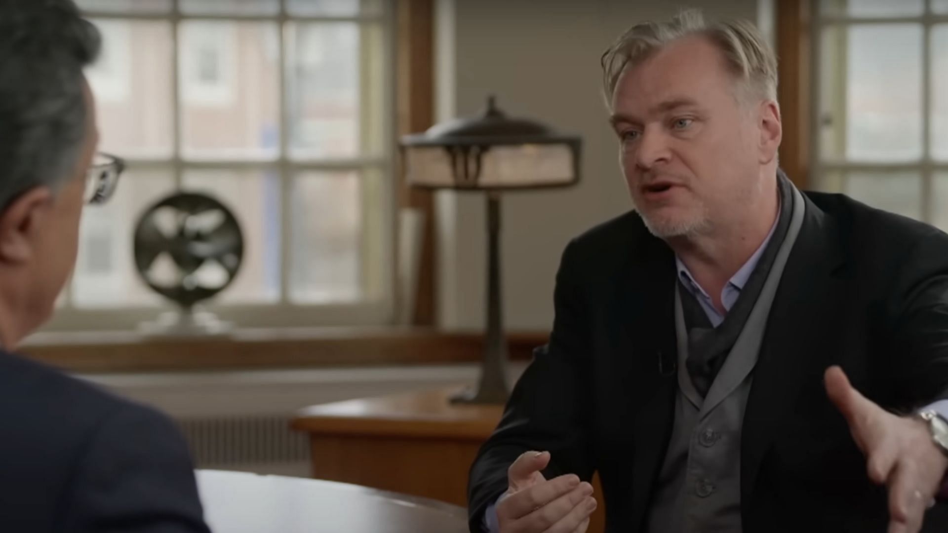 Nolan discusses Oppenheimer on the show (Image via YouTube/The Late Show with Stephen Colbert)